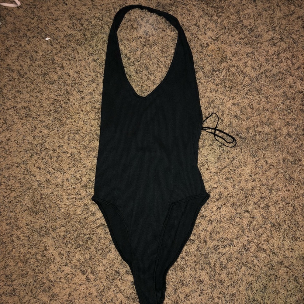 Soft, black halter bodysuit with open back